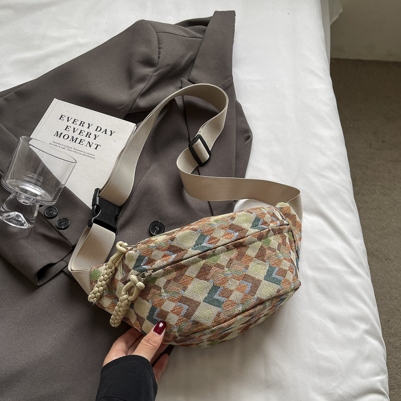 khaki-coloured chest bag